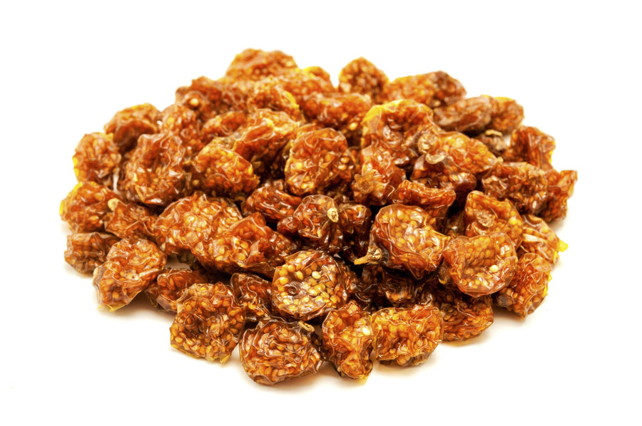 Closeup of multiple Sun Dried Golden Berries on white background