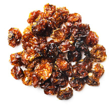 Closeup image of Sun Dried Golden Berries on white background