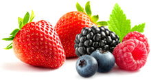 Image of Mix Berries of a  blueberries, strawberries, blackberries and raspberries with green leaves in the back