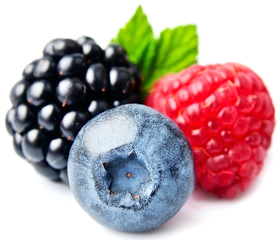 Close photo of fresh raw blackberry, red raspberry, and blueberry