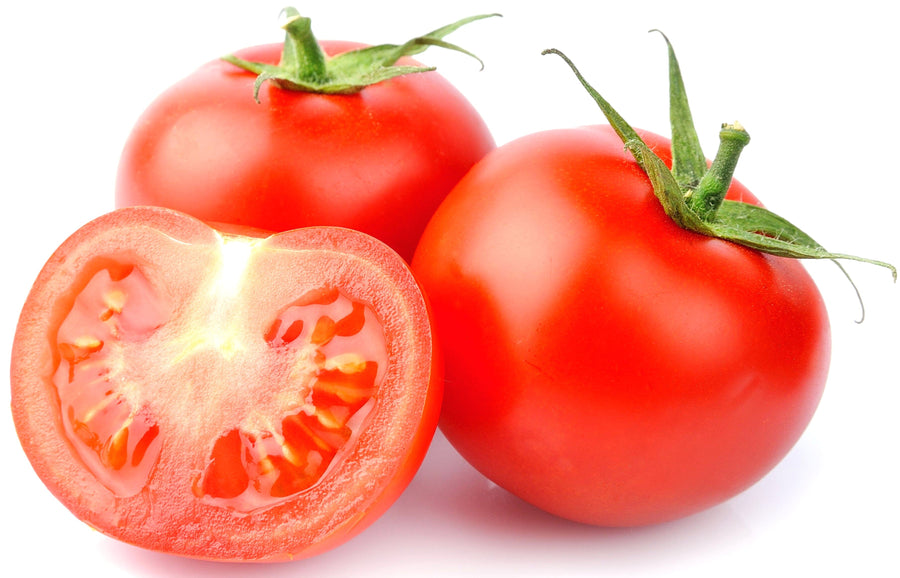 Image of Tomato sliced and 2 other tomatoes on white background