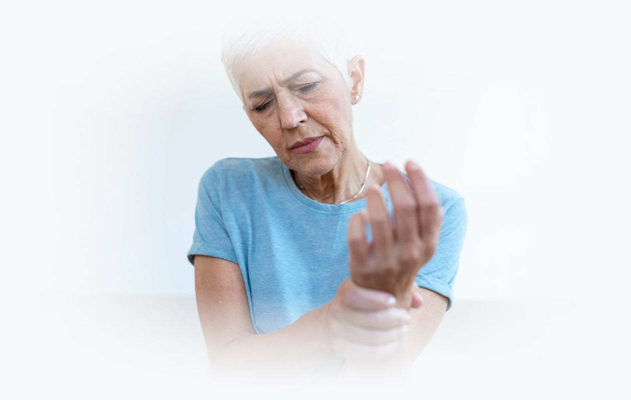 Image of woman in pain because of arthritis in wrist