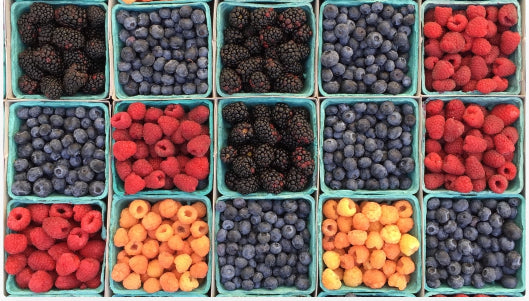 15 square containers filled with various types of fresh Berries